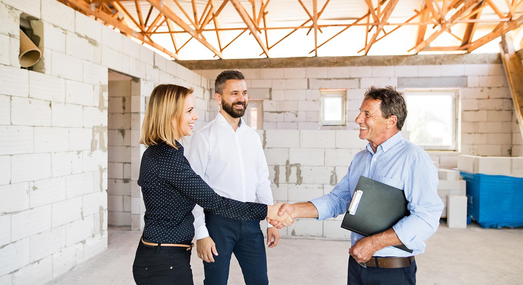 shaking hands with contractor